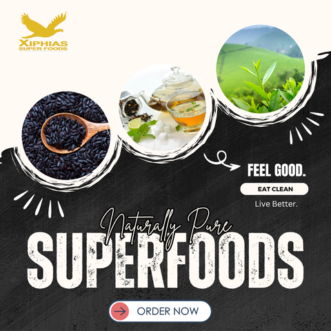 A white tea cup and a bowl of black rice on wooden background – natural Indian superfoods by Xiphias