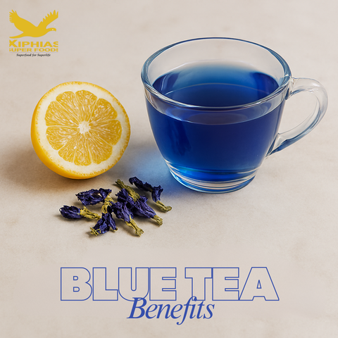 Blue pea flower tea with lemon slice floating on the surface in a clear glass cup