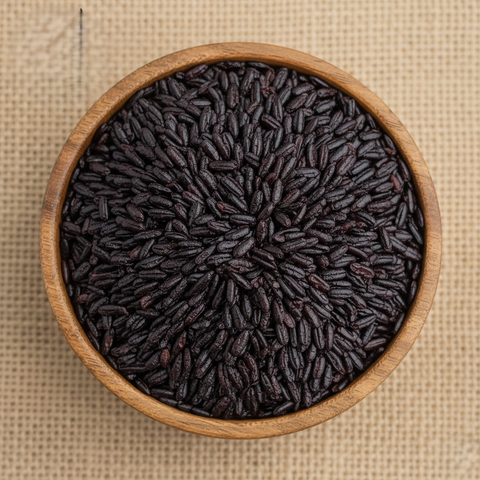 Organic black rice grains in bowl antioxidant-rich superfood from Xiphias Superfoods.