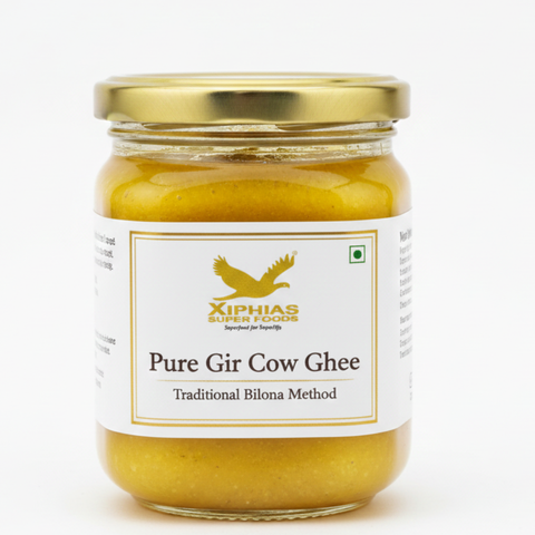Premium Gir Cow Ghee in glass jar by Xiphias Superfoods, traditional bilona method, rich golden texture